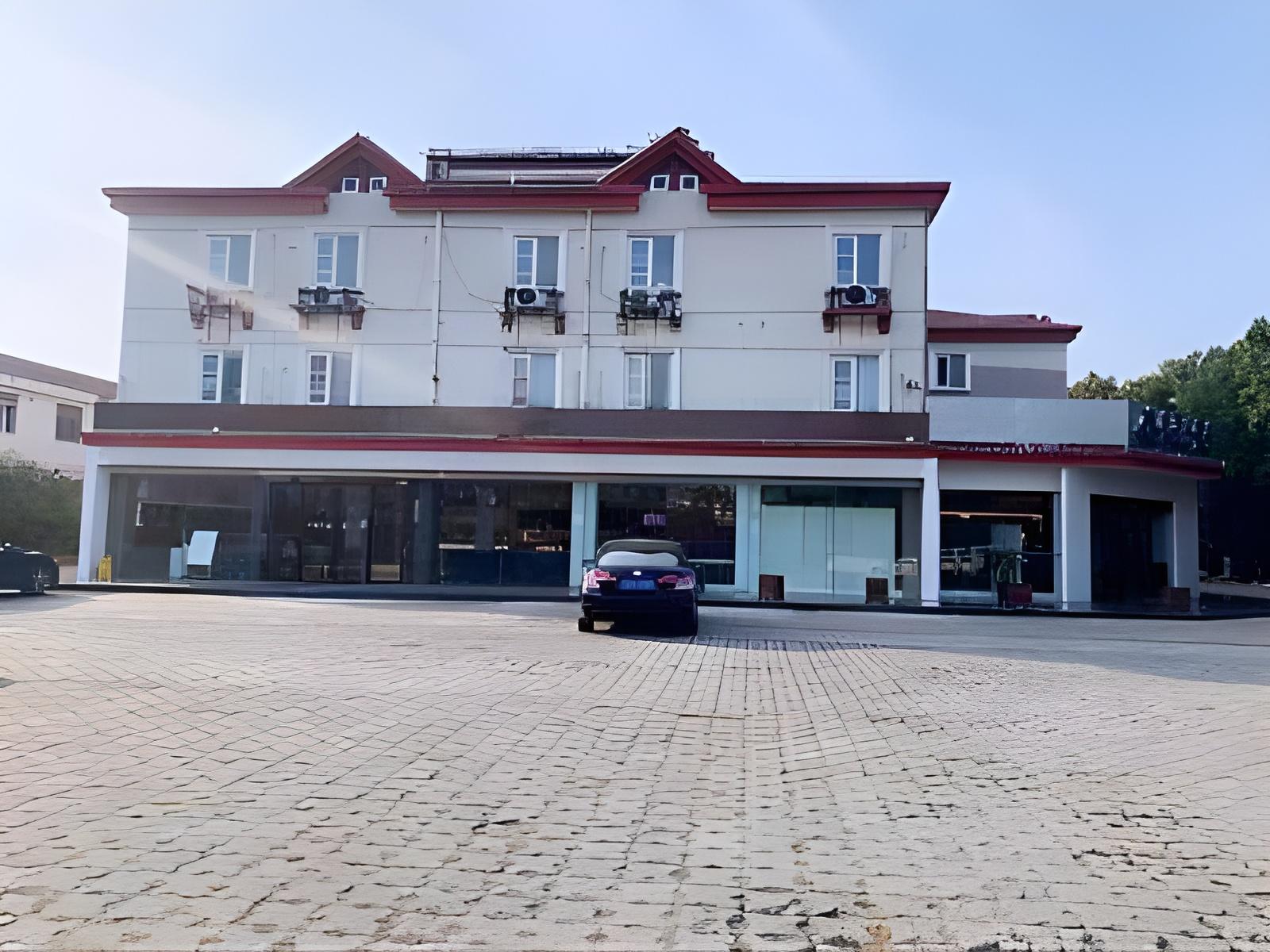 Magnolia Hotel (Yixing bus station store) 5/64