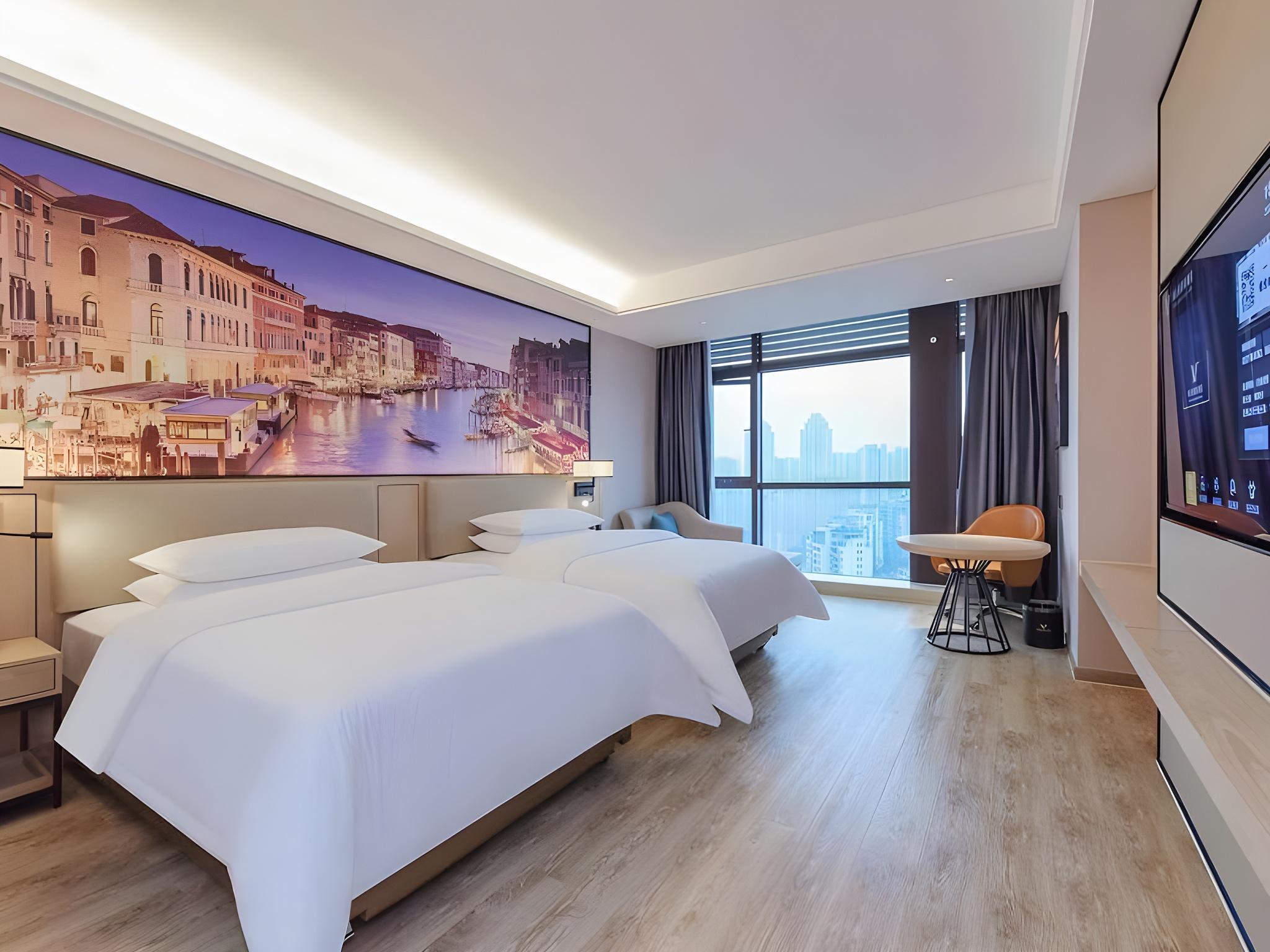 Vienna International Hotel (Nanchuan District Wanda Plaza) 31/56