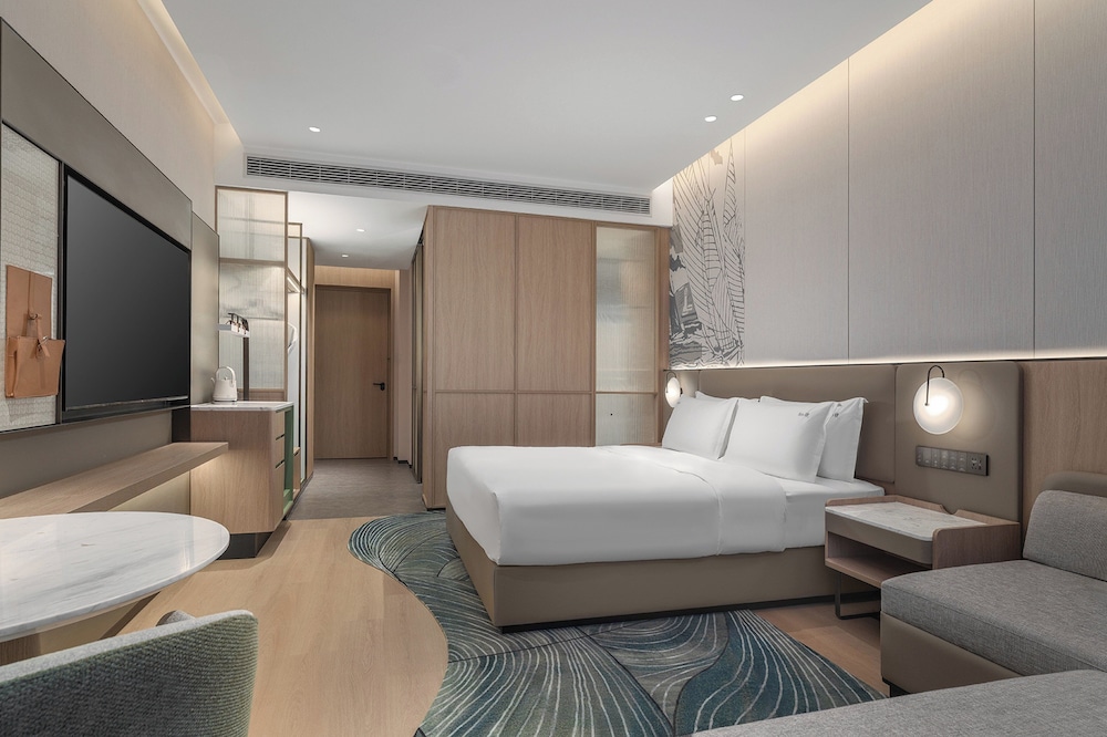 غرفة قياسية بسرير كينج بإطلالة على البحيرة، Holiday Inn Nantong Tongzhou Bay by IHG 2/7