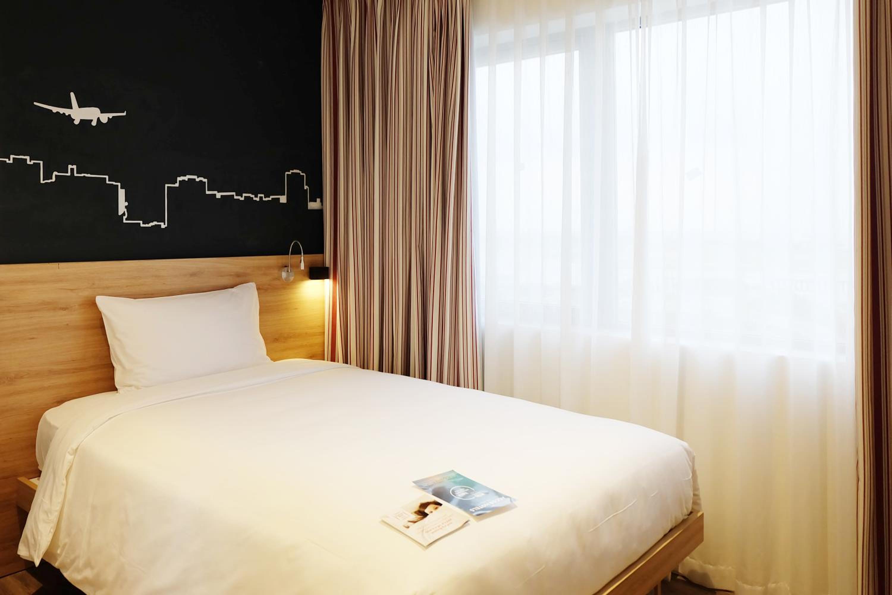 شقة بسرير كينج بغرفتي نوم، Ibis Saigon Airport 4/9