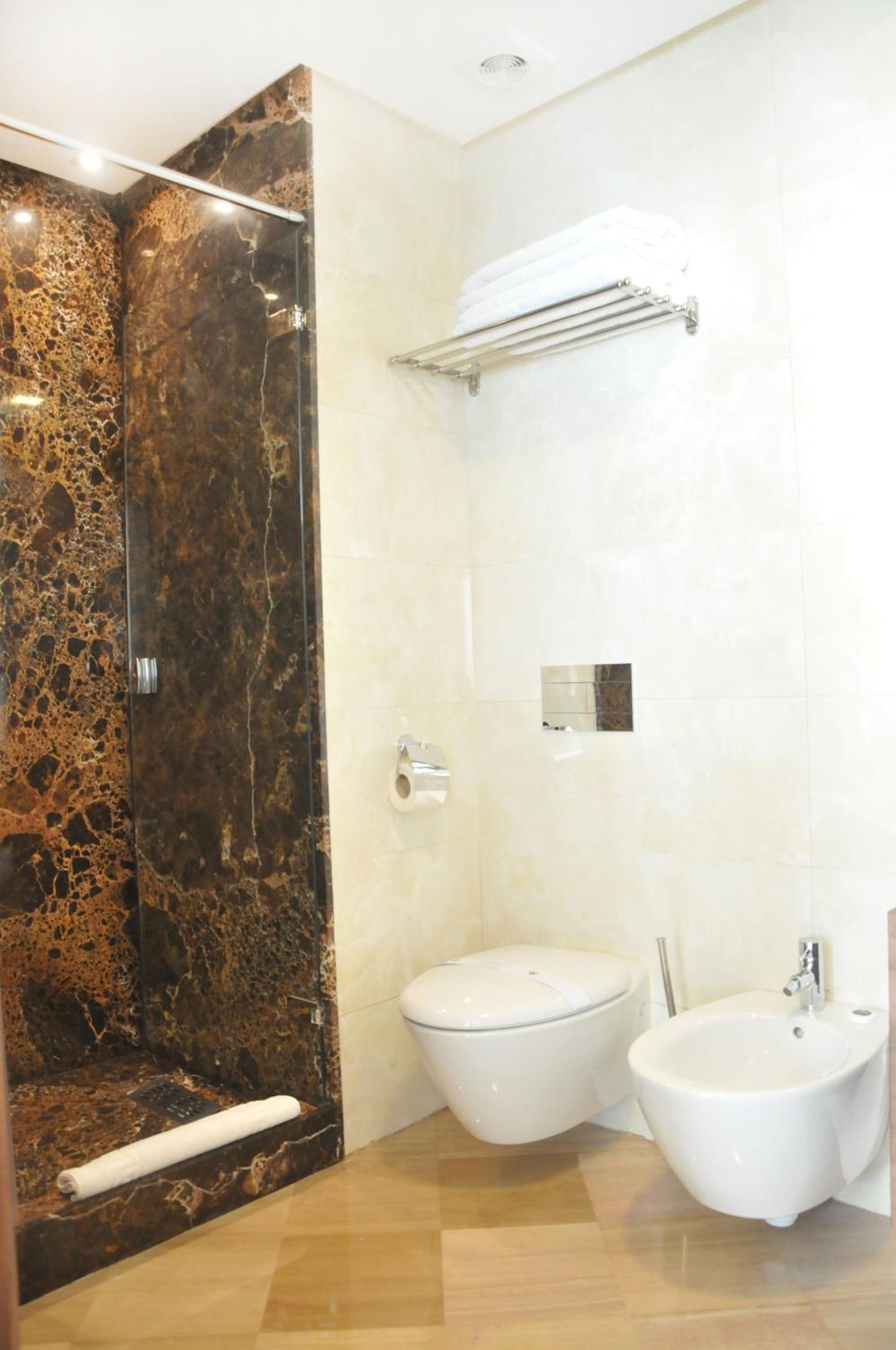 جناح جونيور كلاسيكي بسرير كينج وسرير كوين مع أريكة، Suite Hotel Casa Diamond 4/14