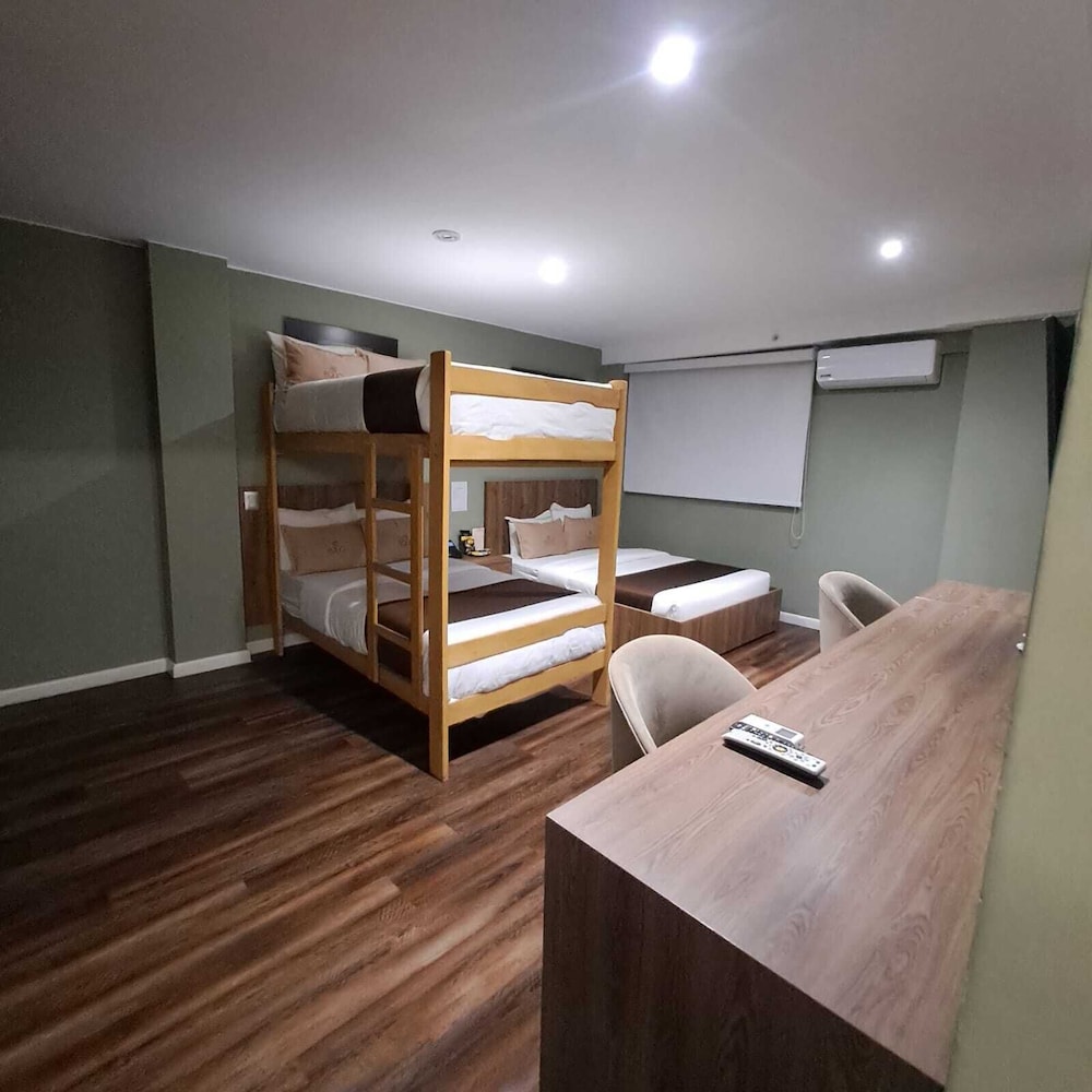 غرفة عائلية بسرير بطابقين وسرير كوين، Equo Hotel Boutique 2/4