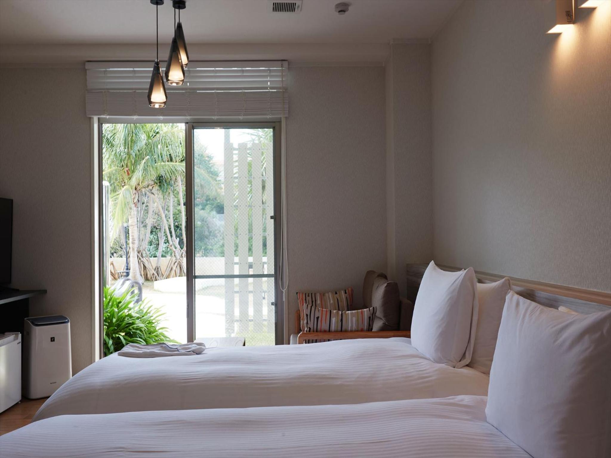 غرفة بسريرين منفصلين، La Casa Panacea Okinawa Resort 4/10