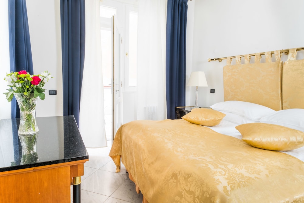 غرفة عائلية بسرير كينج وسريرين منفصلين، Hotel Leon D'oro 2/4
