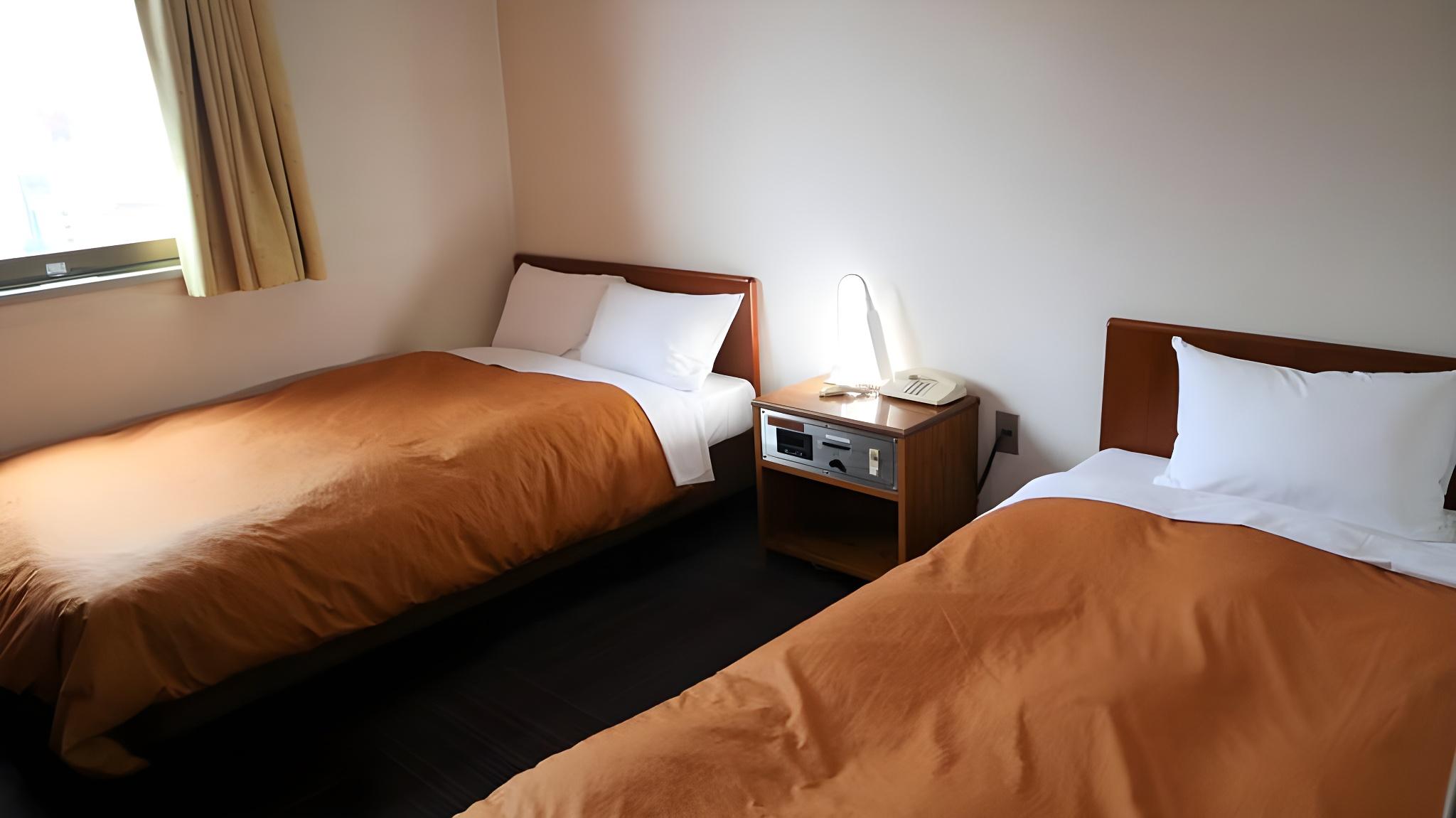 Economy, Family, 1 Single and 1 Single Bed, Smoking