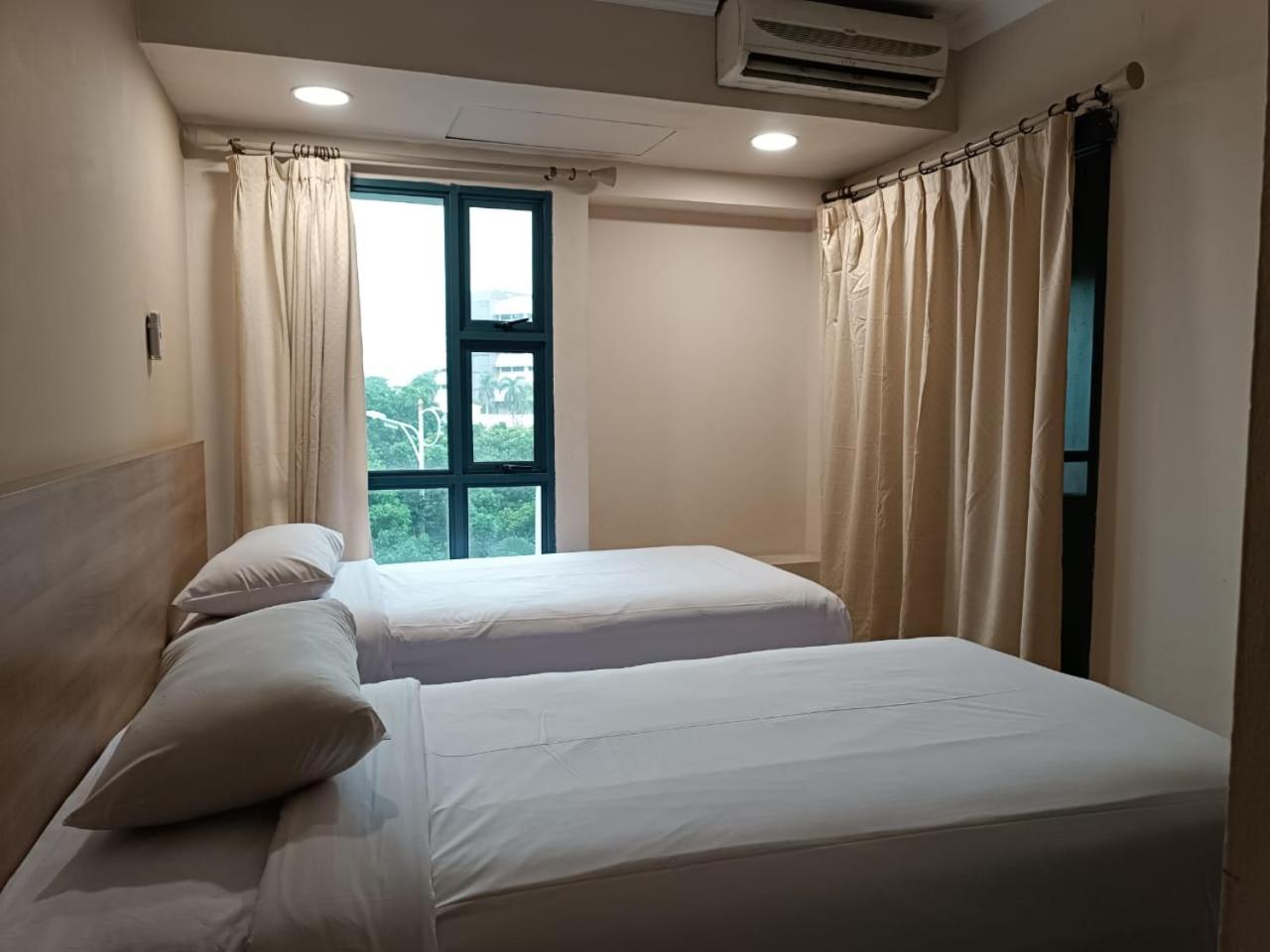 غرفة عائلية بسرير مزدوج وسريرين منفصلين بغرفتي نوم، Grand Tropic Suites Jakarta 3/3