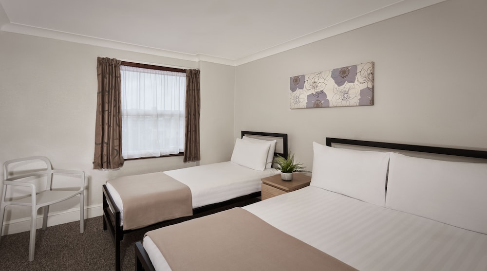 SUPERIOR, TRIPLE, 1 DOUBLE AND 1 SINGLE BED