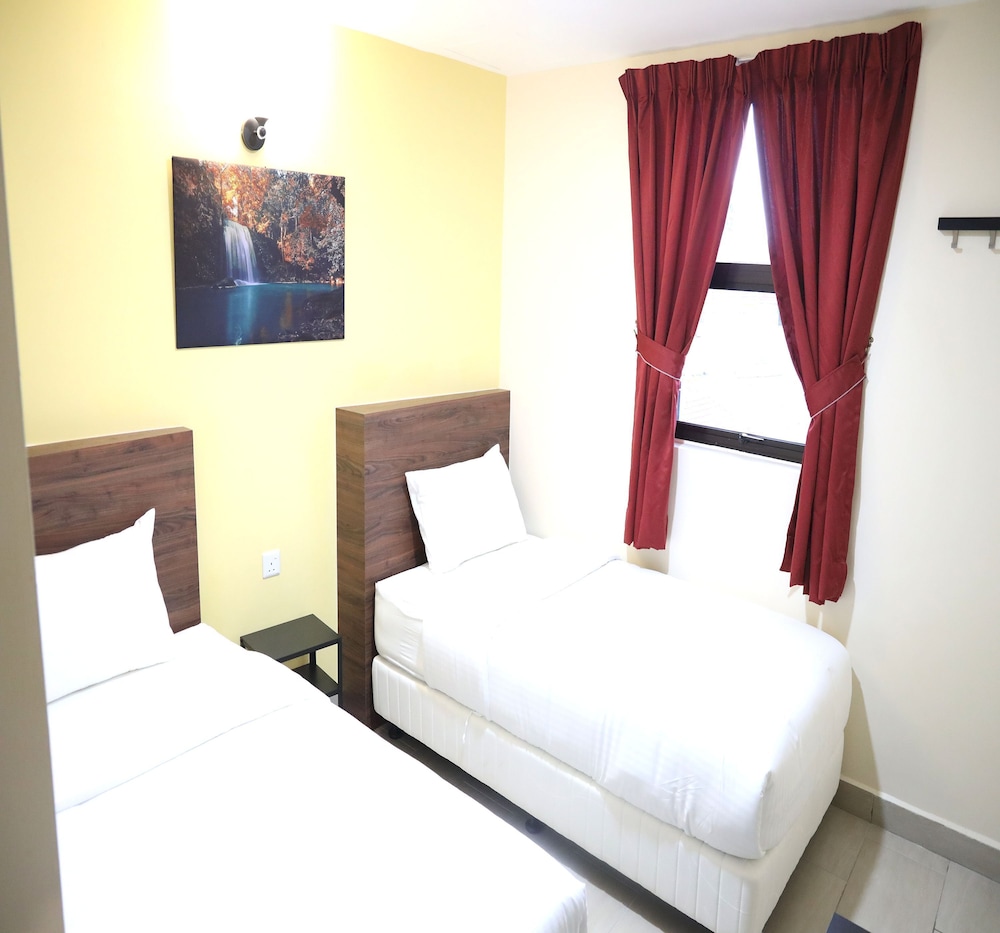 Capital O 90897 Island City Hotel 30/50