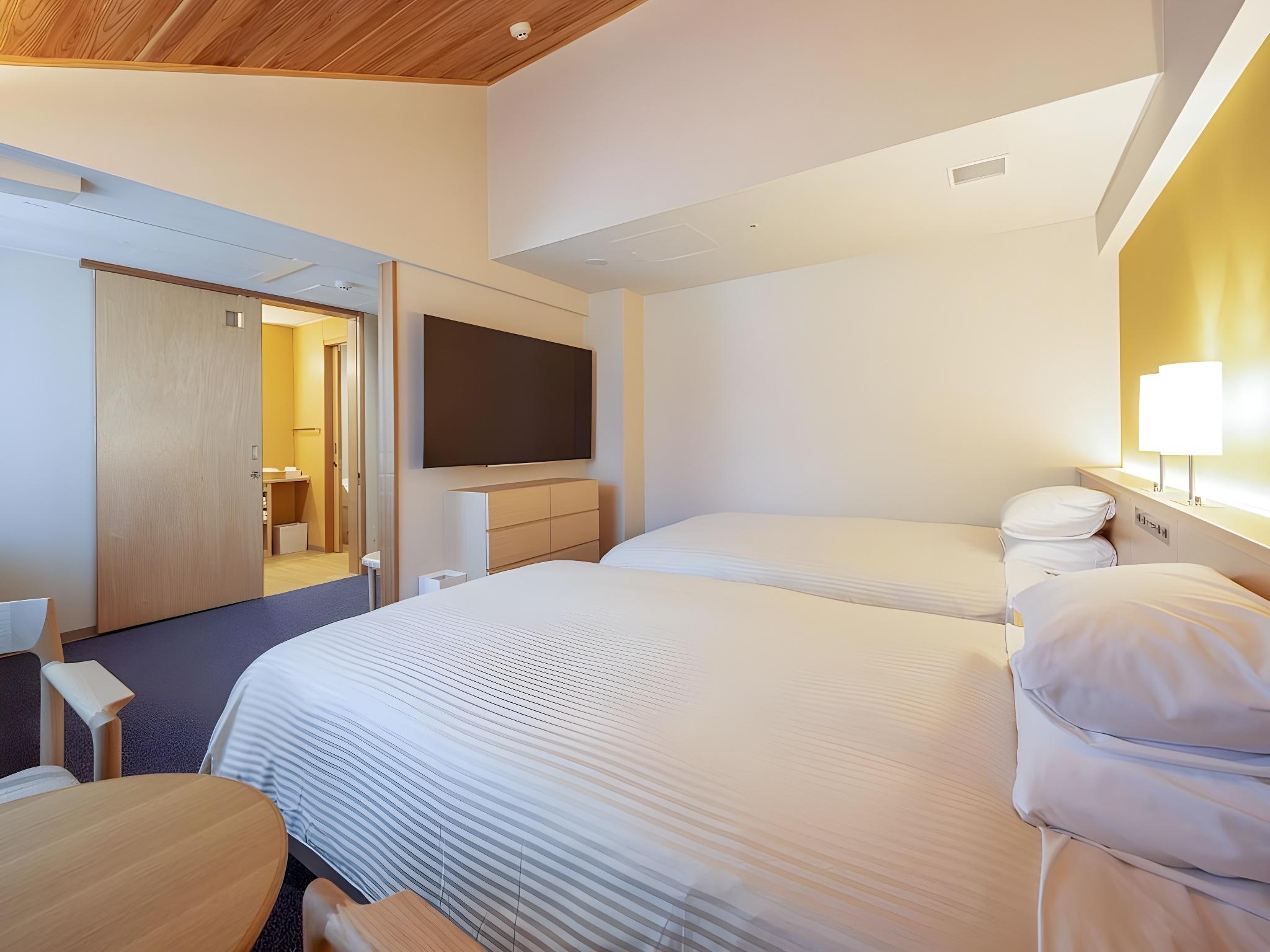 Deluxe, Twin Beds, 2 Double Beds
