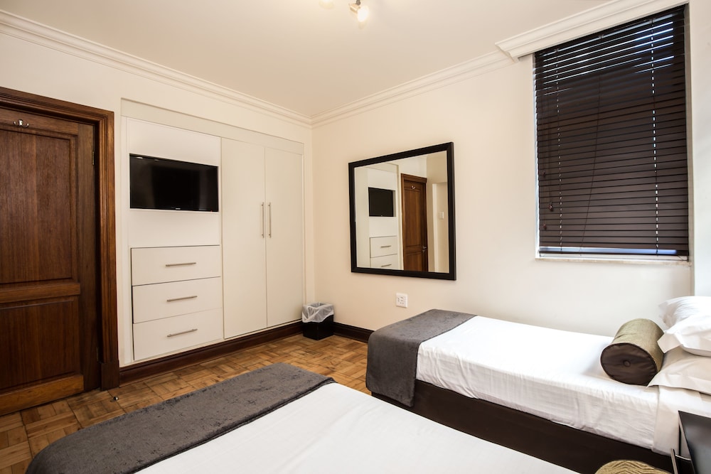 ROOM, KING BED, SIDE VIEW, BATH AND SHOWER
