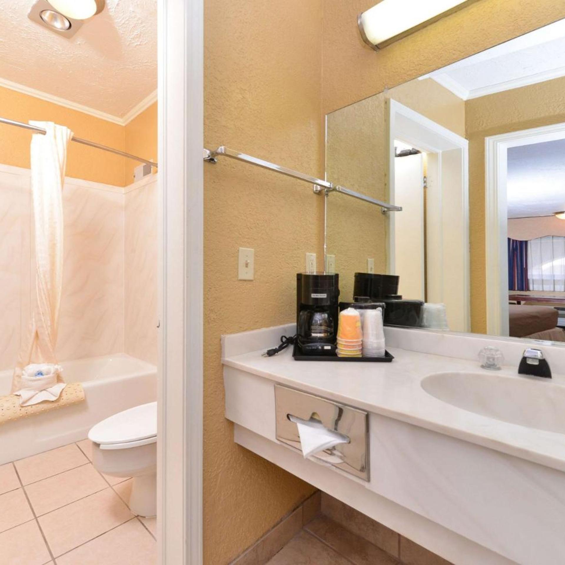 Executive Plus Inn and Suites 20/20