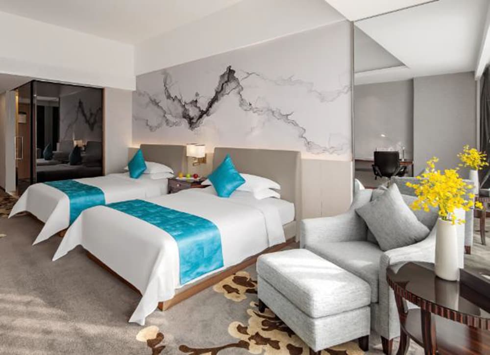 غرفة ديلوكس بسريرين منفصلين، Huaqiang Plaza Hotel 4/5