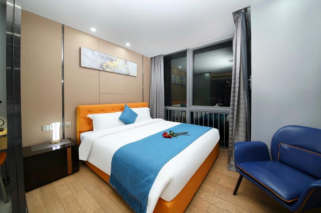 جناح تنفيذي بسرير كينج بغرفة نوم واحدة، Pengman International Apartment Hotel (Beijing Road Jiedeng Duhui) 6/10