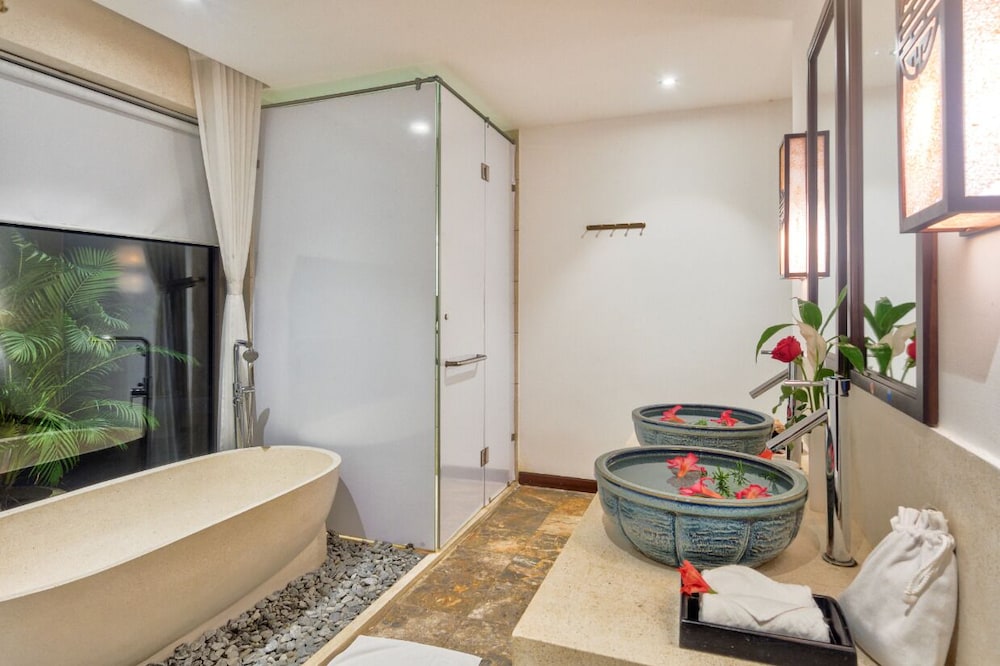 غرفة كلاسيكية ثلاثية بسرير كينج وسرير فردي بإطلالة على الحديقة، Hoi An Ancient House Resort And Spa 4/4
