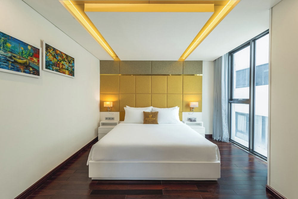شقة بسريرين منفصلين وسريرين كينج بإطلالة على البحر بـ3 غرف نوم، Mandila Beach Hotel Danang 3/5