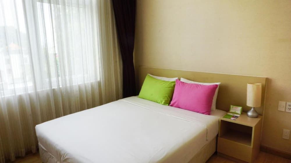 شقة ديلوكس بسرير كوين بإطلالة على المدينة بغرفة نوم واحدة، G8 Center Hotel Saigon 4/8