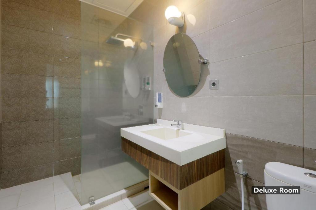 غرفة ديلوكس، Oyo 128 Mutiara Suites 5/6