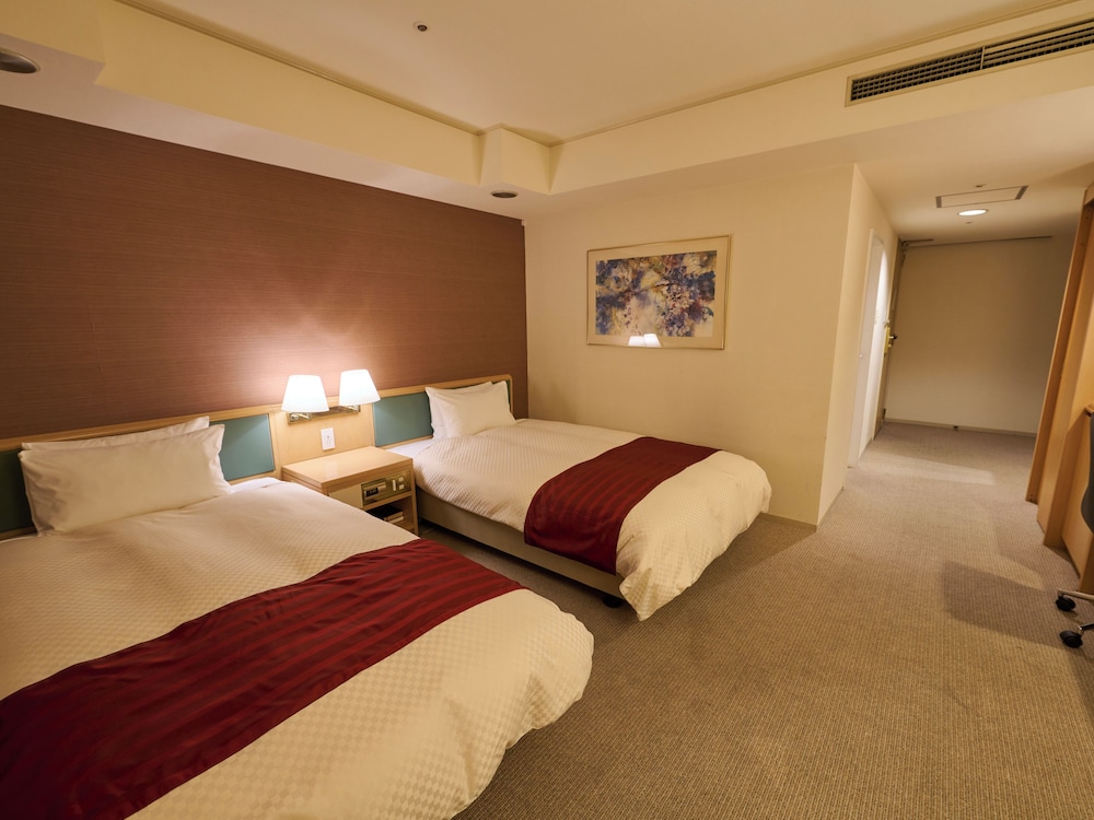 DELUXE, TWIN BEDS