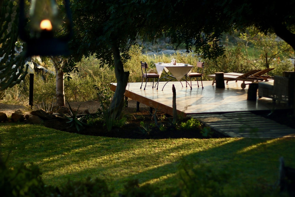 Ivory Wilderness River Rock Lodge 18/24