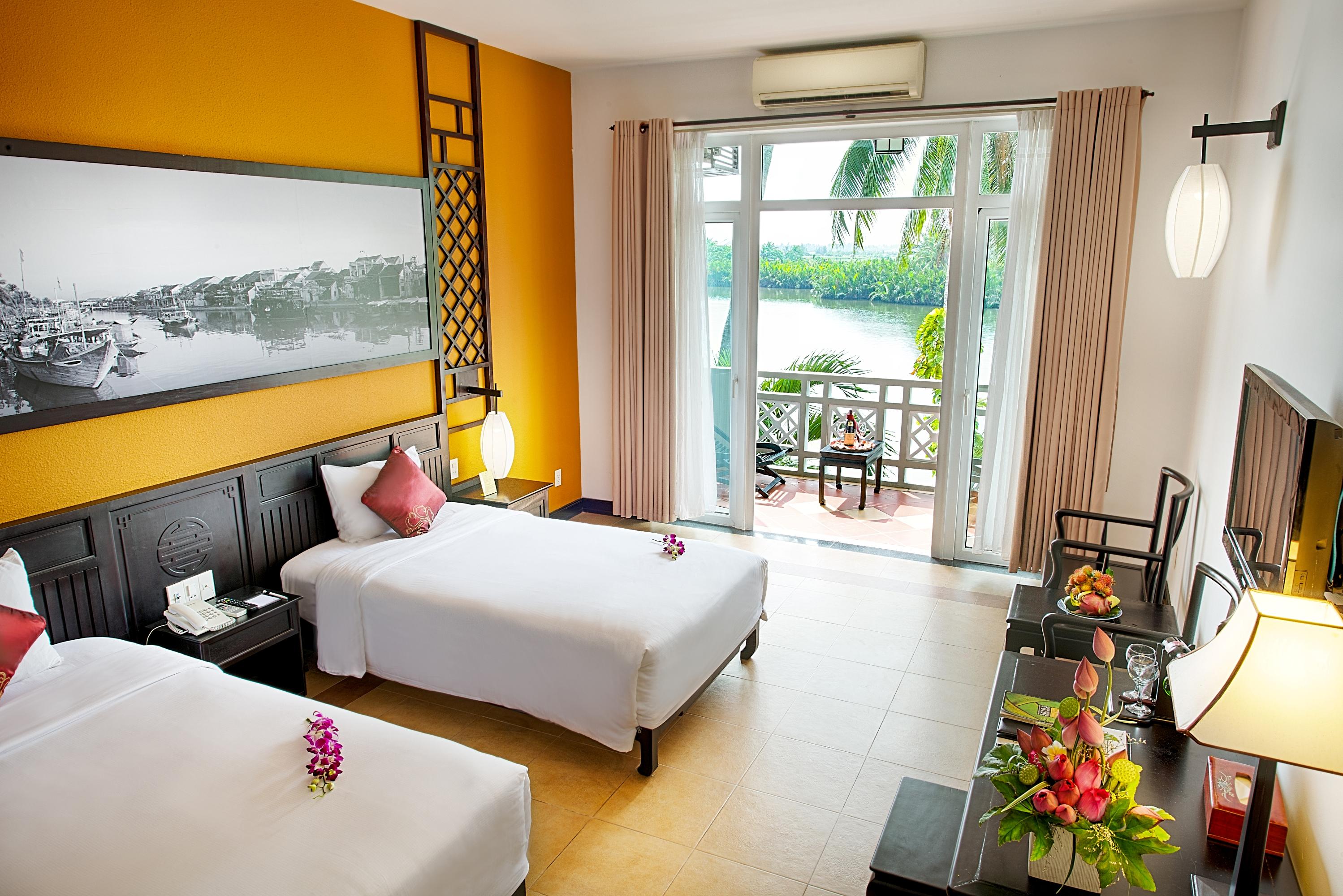 غرفة ديلوكس بسرير مزدوج أو سريرين منفصلين بإطلالة على النهر، Hoi An Beach Resort 2/3