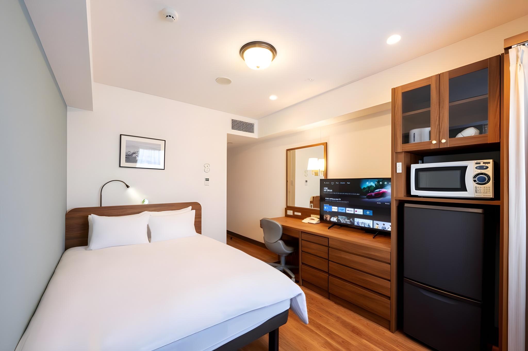 غرفة بزنس بسرير مزدوج بغرفة نوم واحدة في المبنى الرئيسي