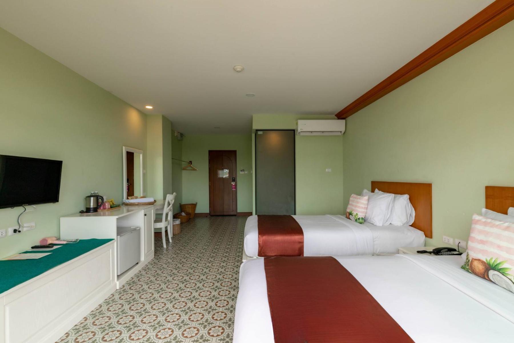 غرفة ديلوكس بسريرين منفصلين، ROYAL PINEAPPLE HOTEL a welcome to wealth and good fortune 2/4
