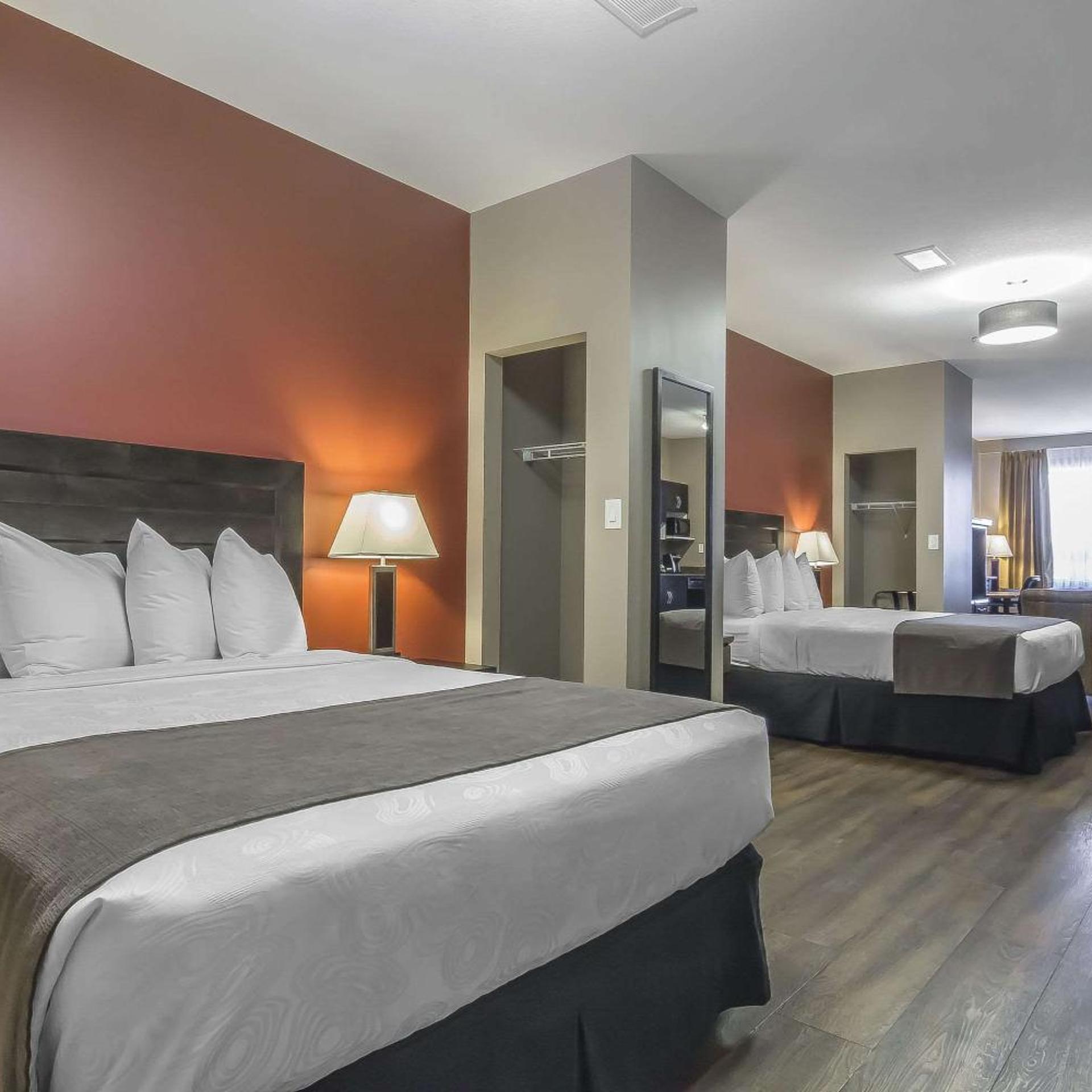 1 Bedroom, Efficiency, Suite, 2 Queen Beds, Sofa, Pet Friendly, Exterior Entrance, Ground Floor