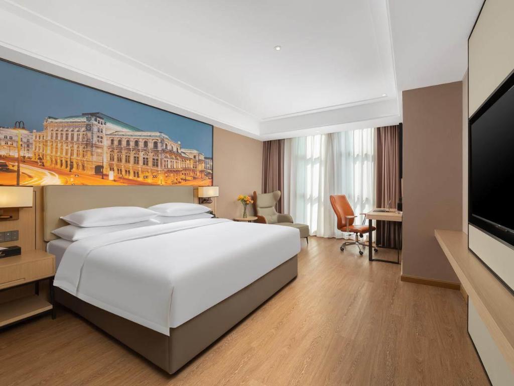 غرفة تنفيذية بسرير كوين، Vienna International Hotel (Chongqing Liangjiang New District Longxing Branch) 2/3