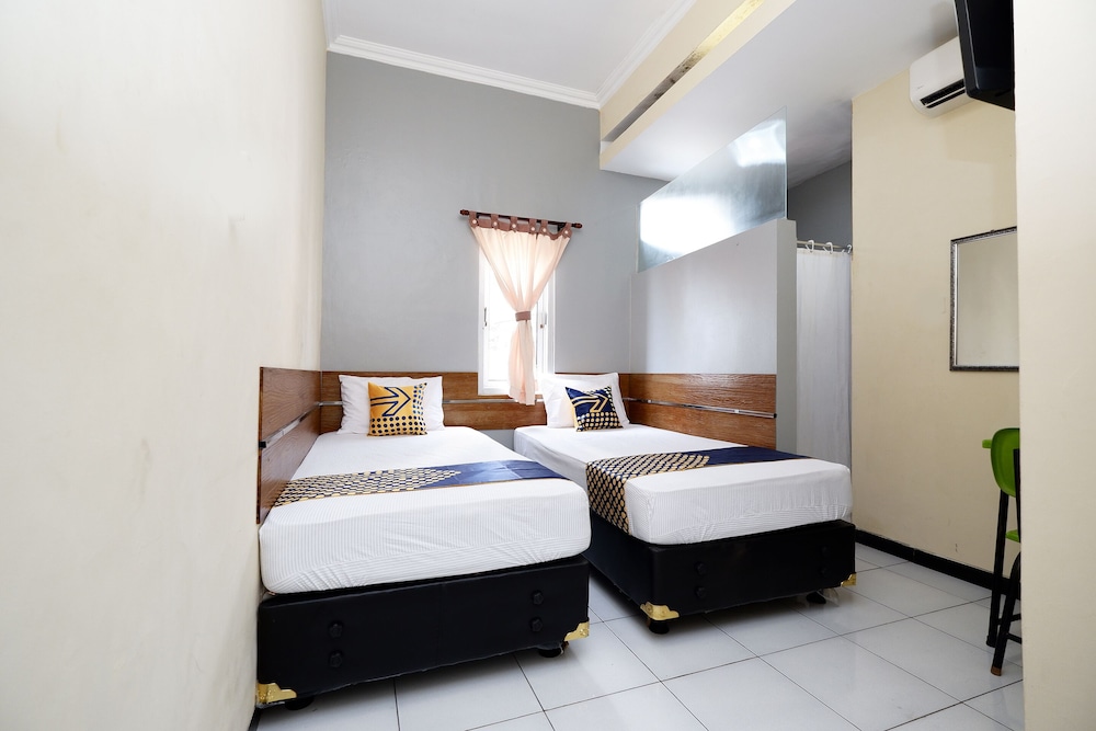 Hotel SUPER OYO 2209 Solo Point Guest House Syariah 13/31