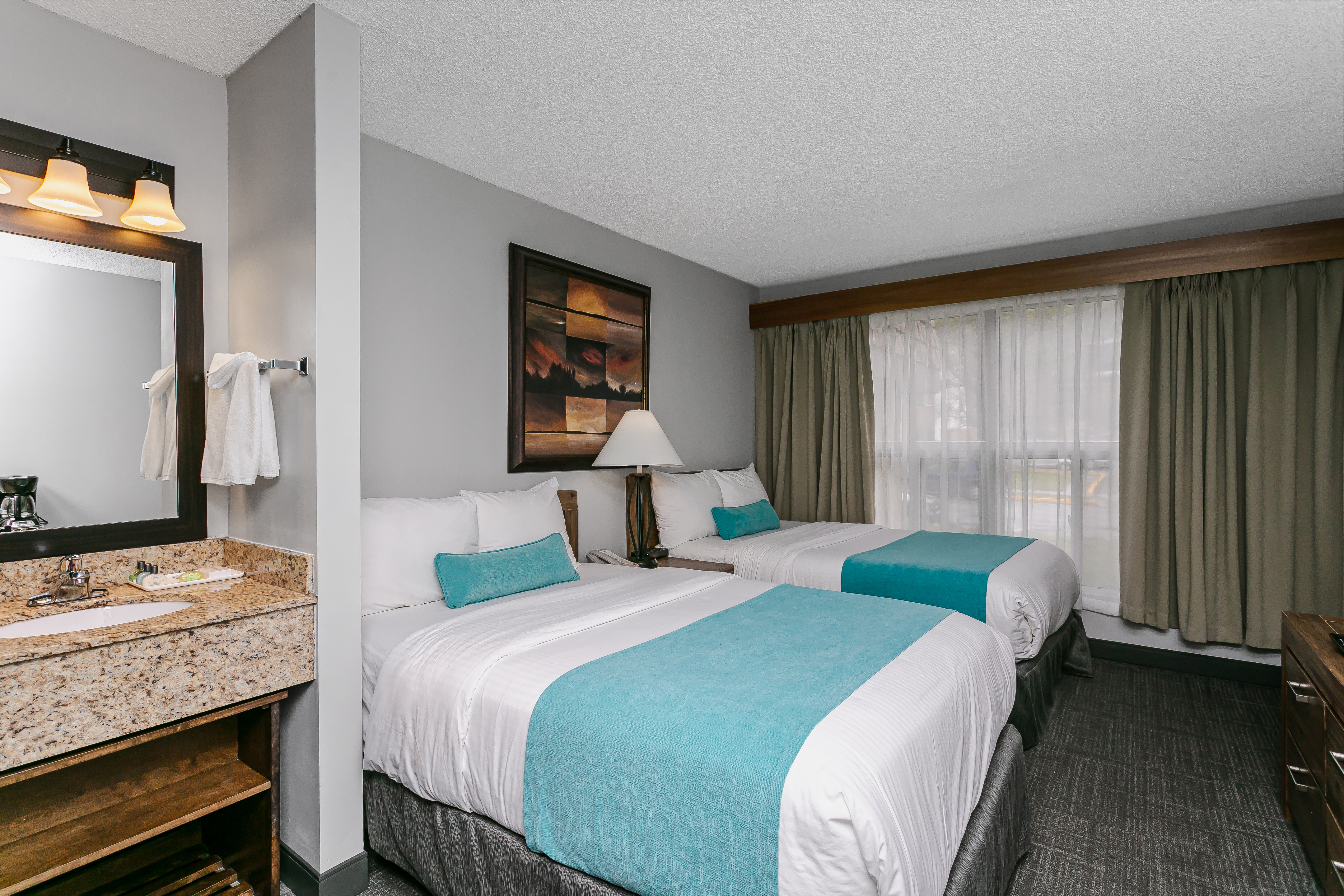 غرفة بسريرين مزدوجين، Tonquin Inn Jasper Hotel 3/8