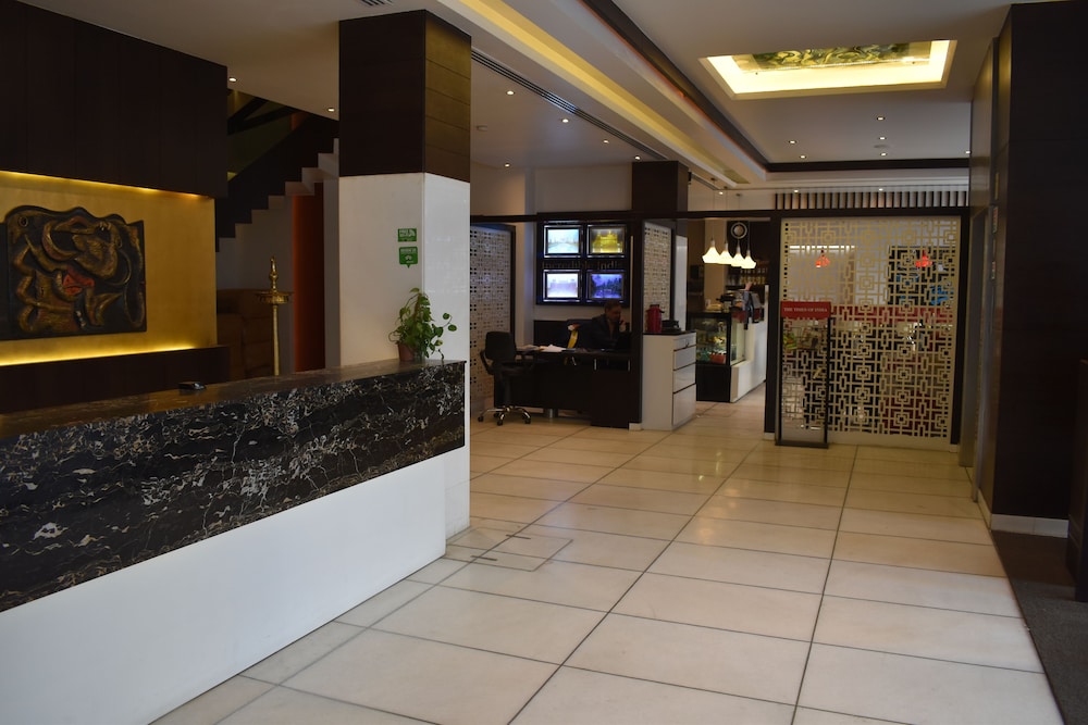 Godwin Deluxe Hotel 13/64