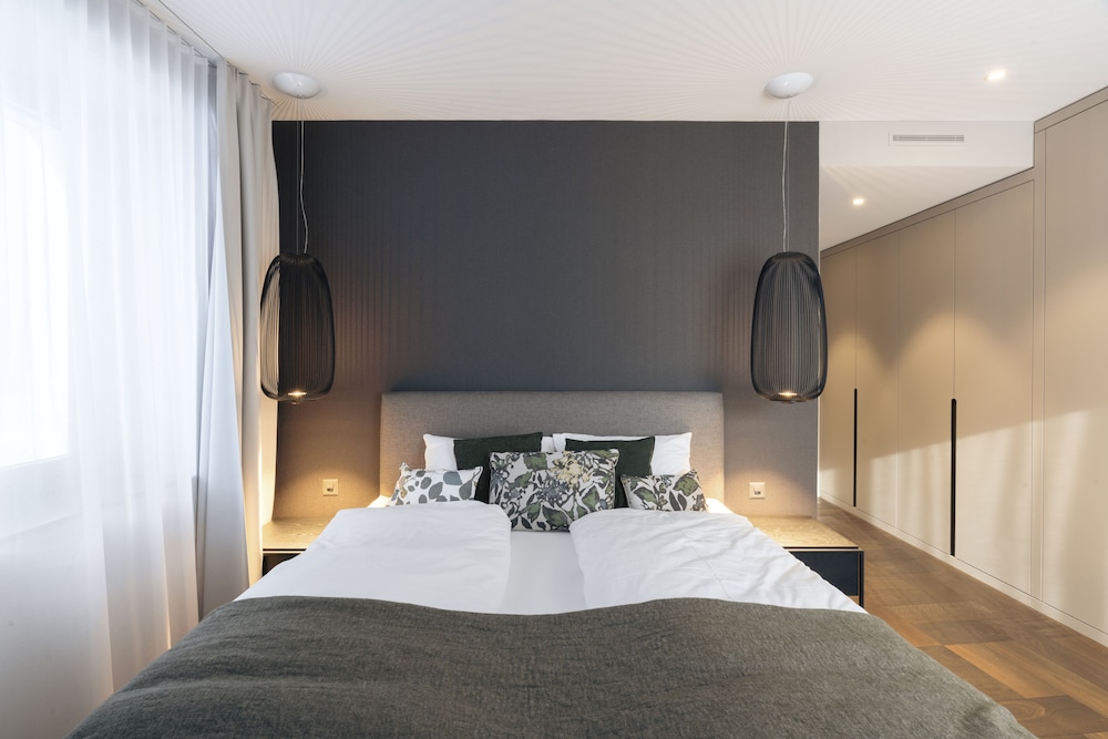 شقة ديلوكس بسريرين كوين بغرفتي نوم مع أريكة، Andermatt Alpine Apartments 6/9