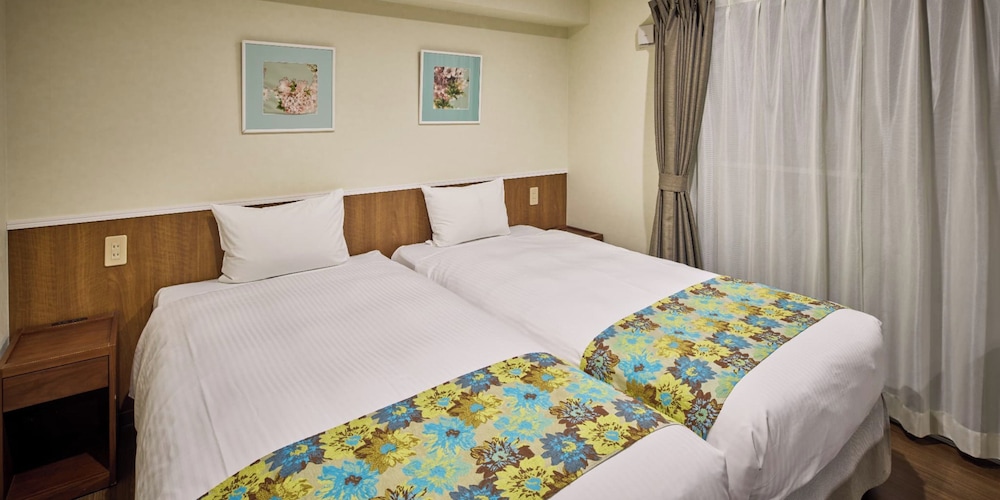 غرفة قياسية بسريرين منفصلين مع أريكة، Seaside Condominium Rana Chatan 6/10