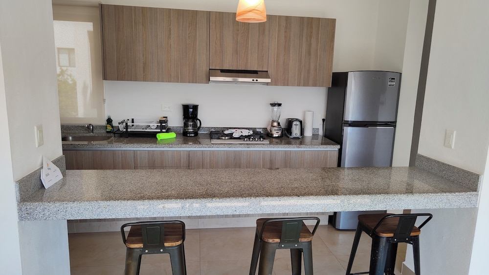 Velas Condos 7/48
