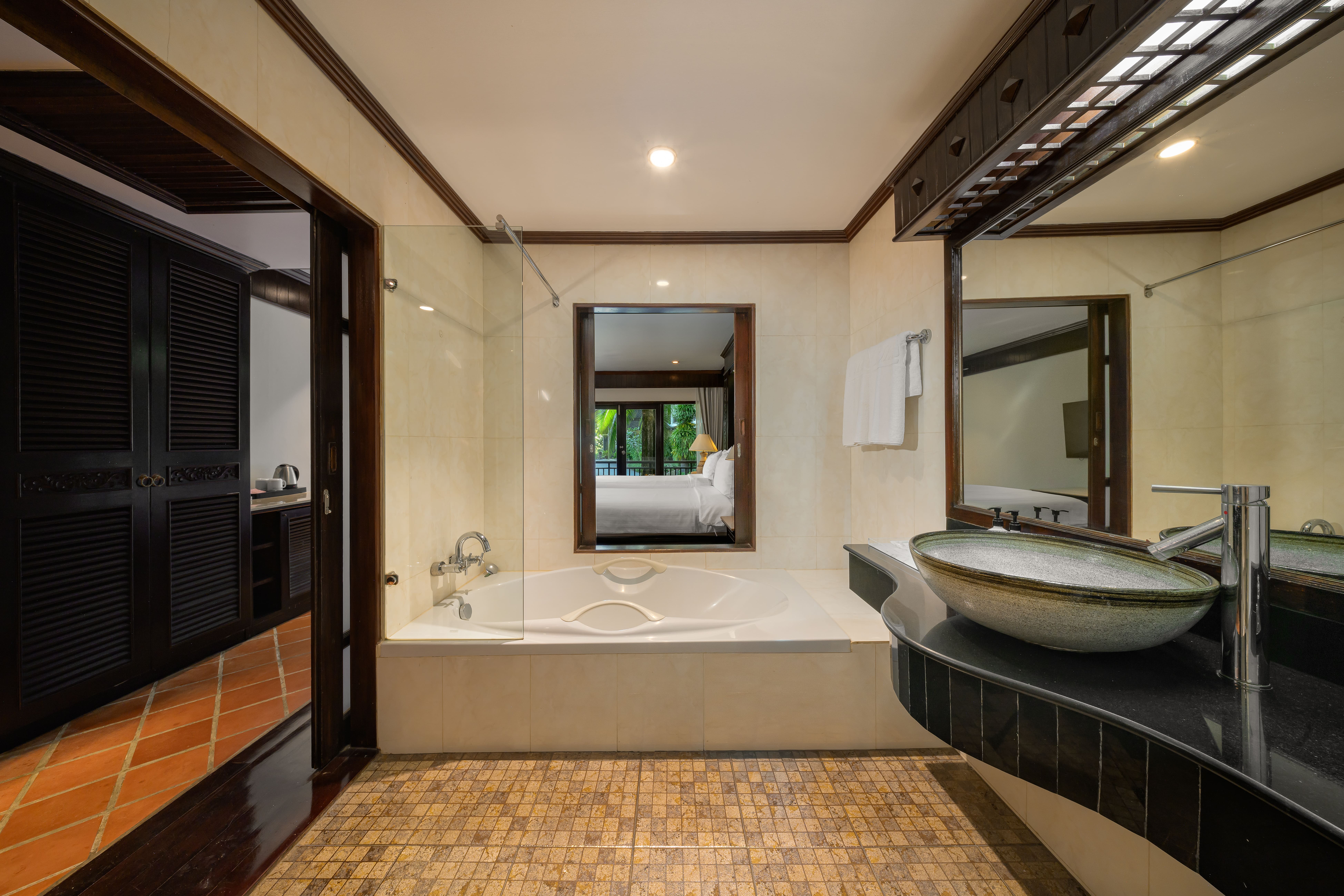 Deluxe Garden Room، The Hotspring Beach Resort and Spa 8/8