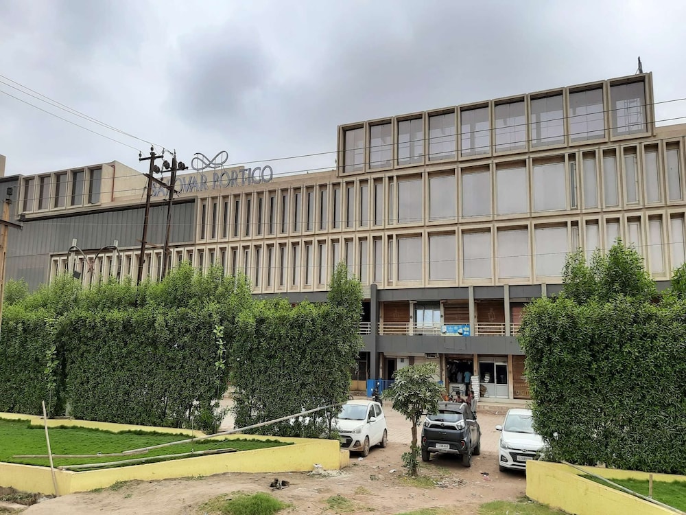Sarovar Portico Morbi 42/50