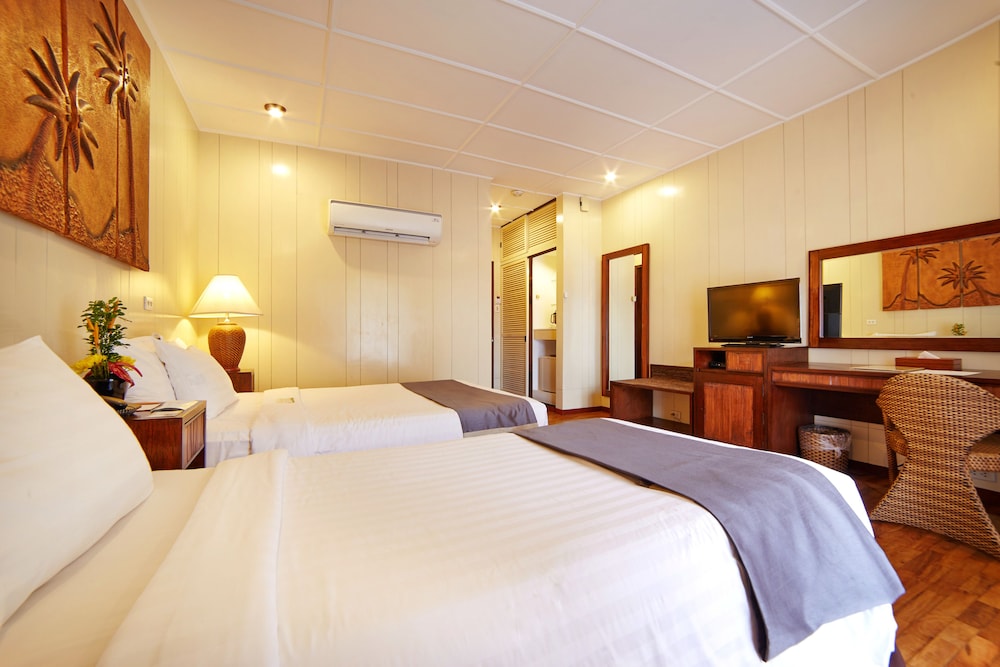 غرفة ديلوكس بسرير مزدوج وسرير فردي، CEBU WHITE SANDS RESORT AND SPA 2/6