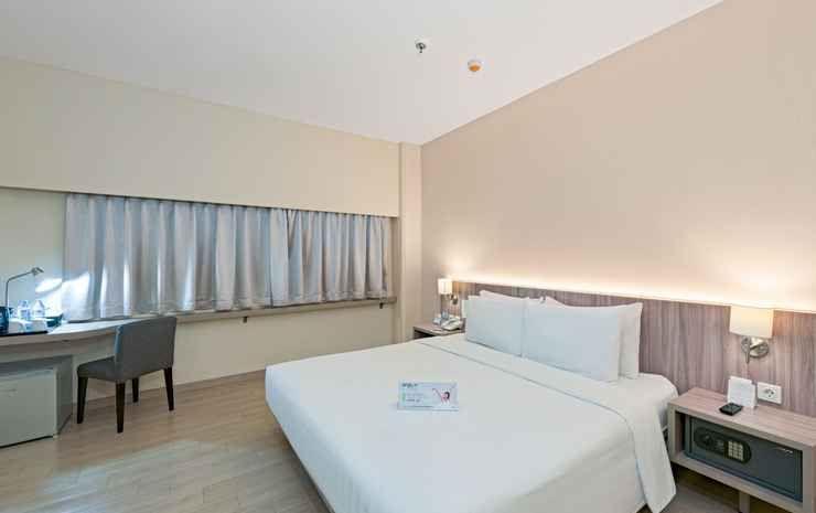 غرفة بريميير بسرير كوين، Grand Whiz Megamas Manado 3/4