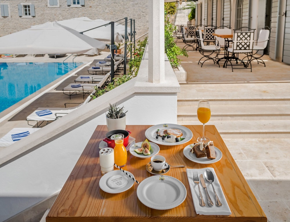 Hotel Martinis Marchi 32/50