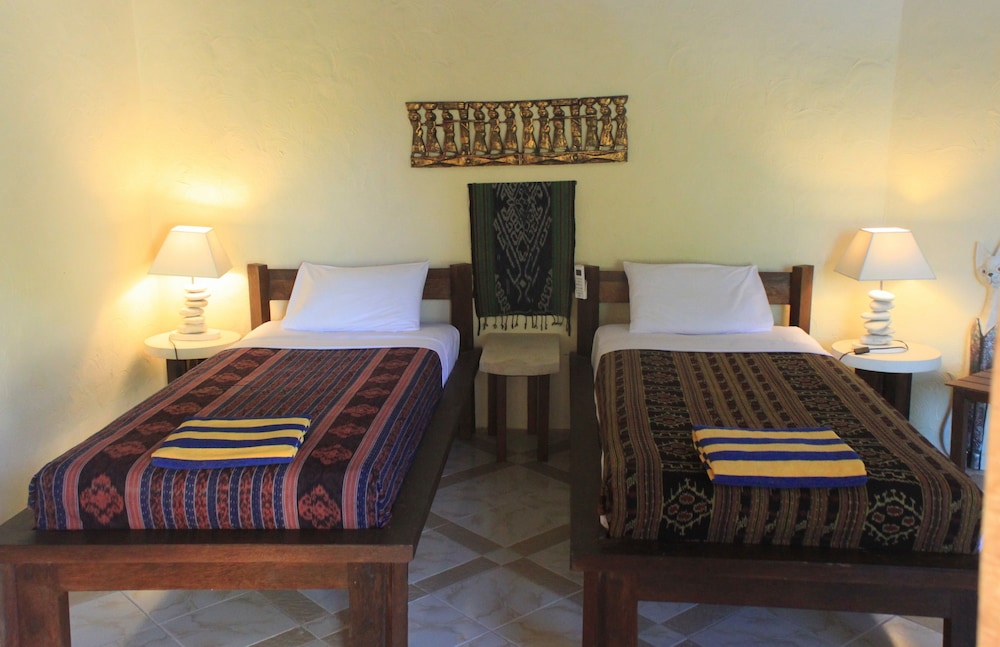 غرفة قياسية بسريرين منفصلين بإطلالة على المسبح بغرفتي نوم، Hotel Uyah Amed Spa Resort 3/5