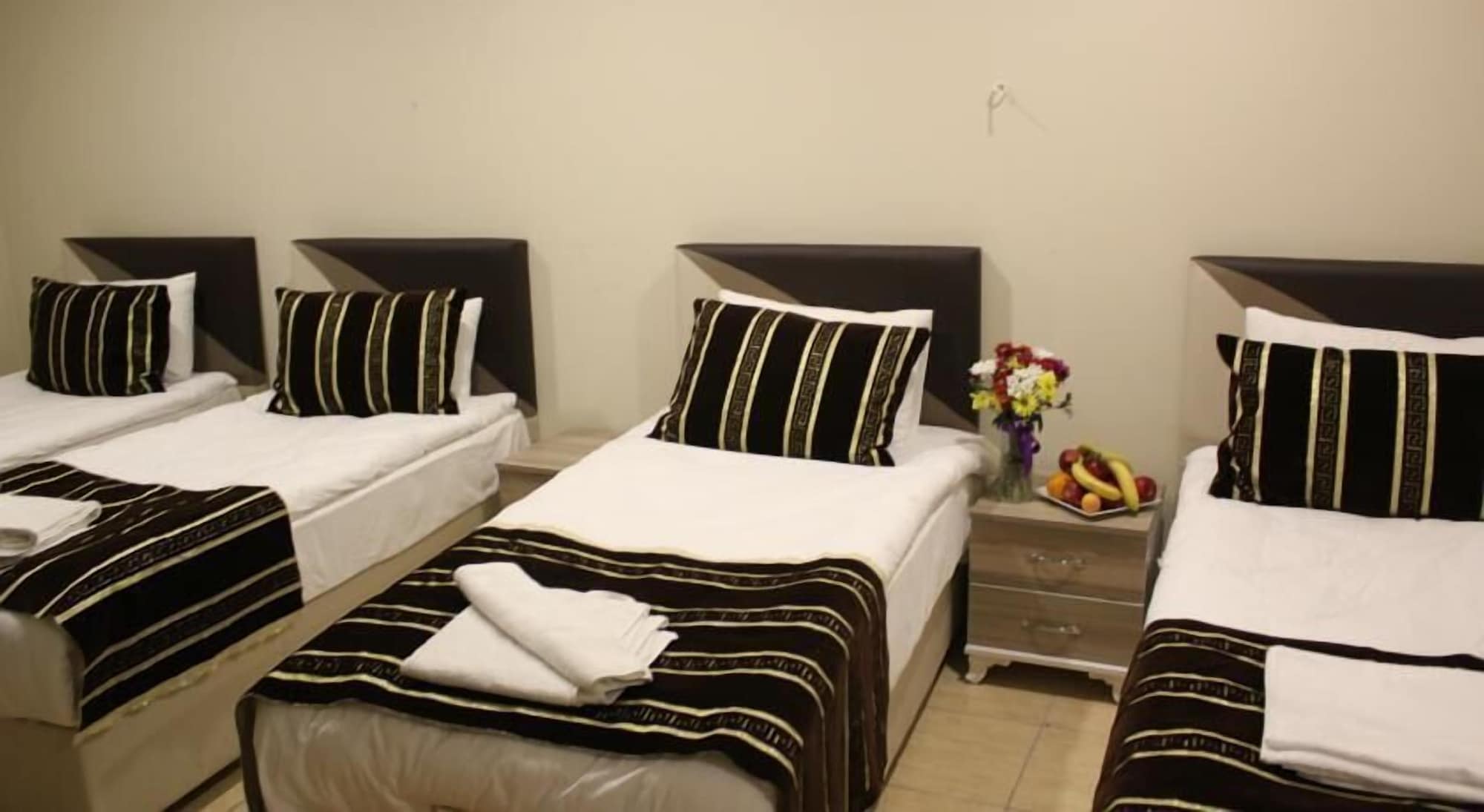 Family, 1 Double and 3 Single Beds
