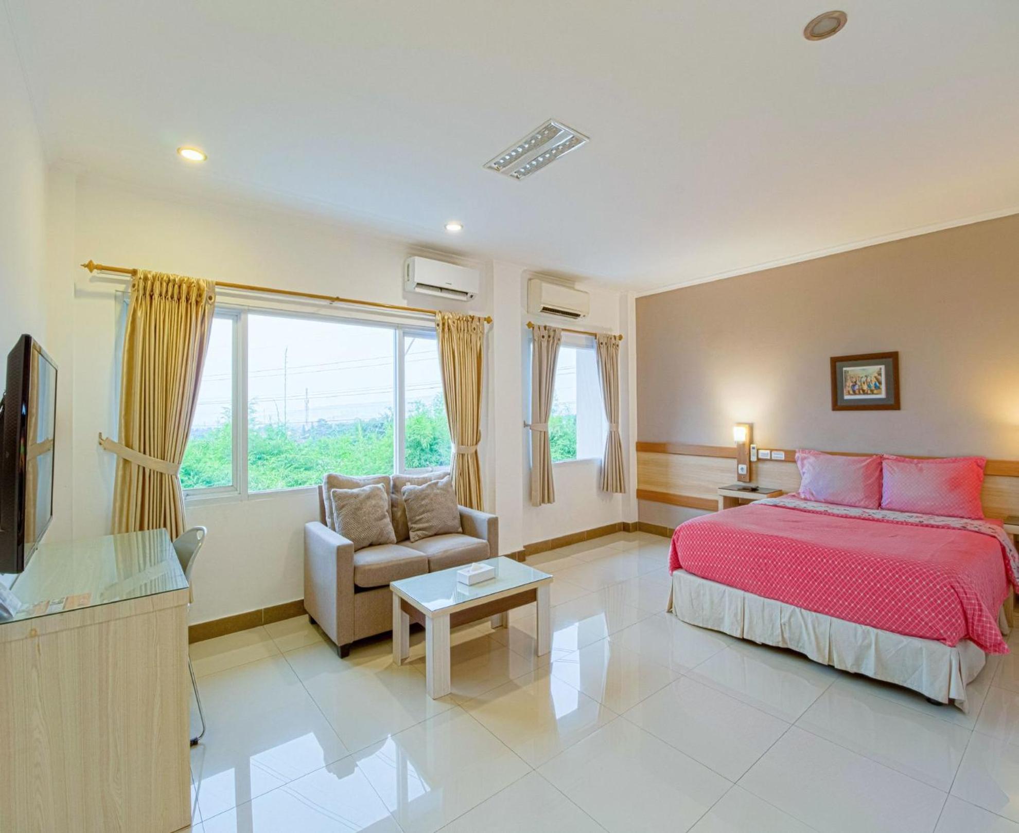 غرفة ديلوكس بسرير مزدوج، Citrus House Com Bogor 5/9
