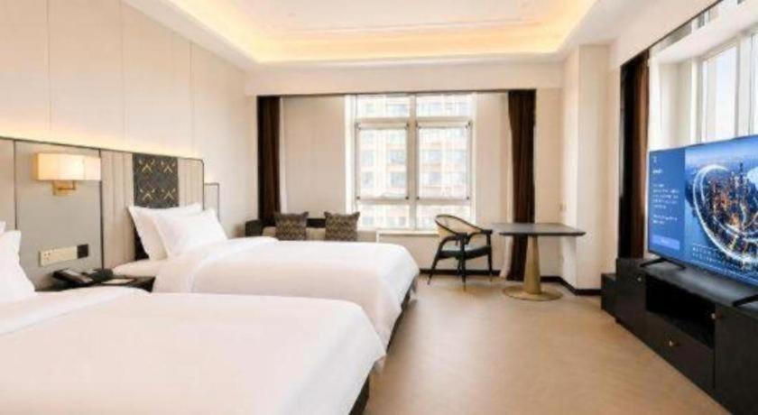 Jinjiang Metropolo Hotel (Qingdao Xinduxin Shuangshan Metro Station) 24/58