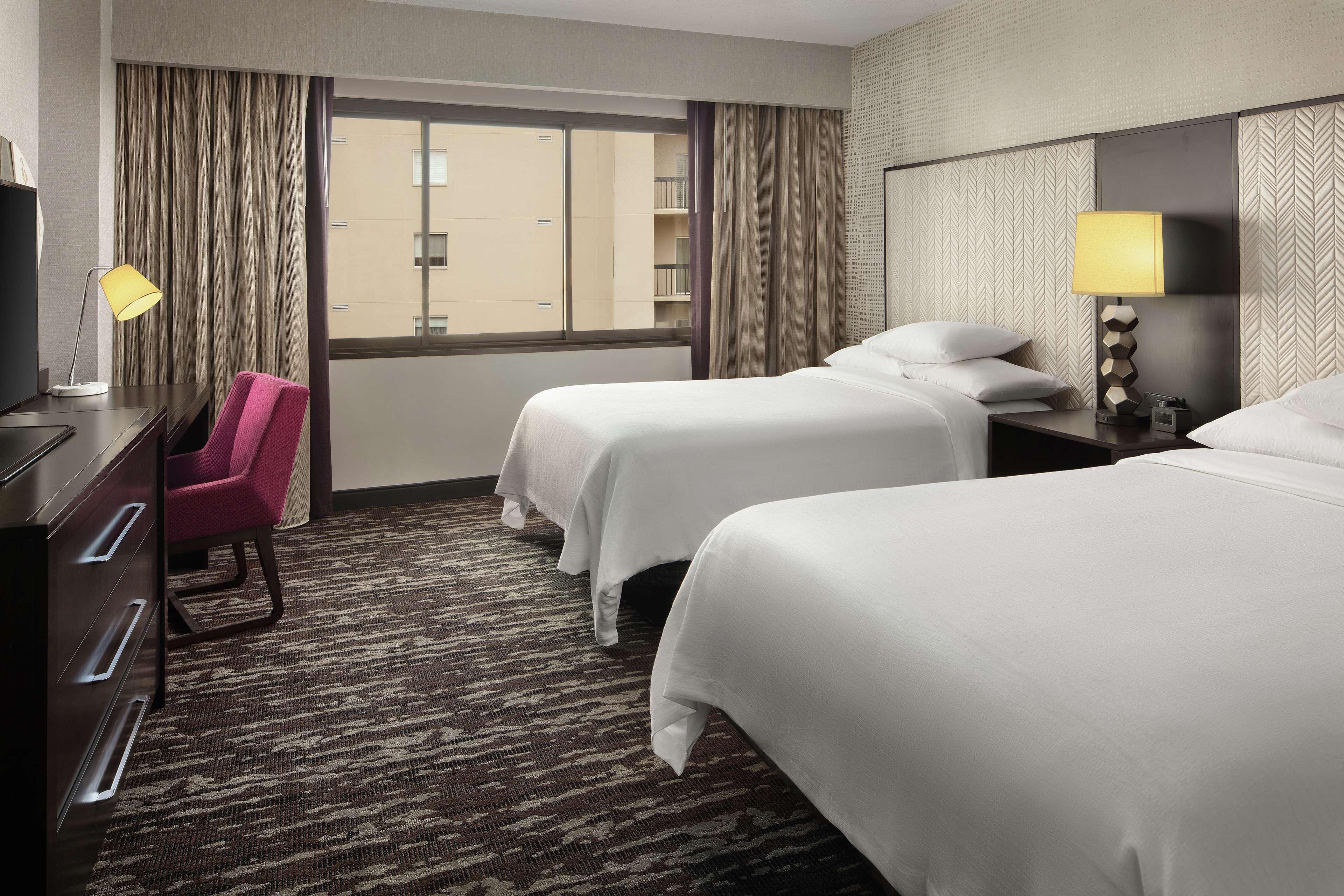 جناح ركني بسريرين مزدوجين بغرفتين