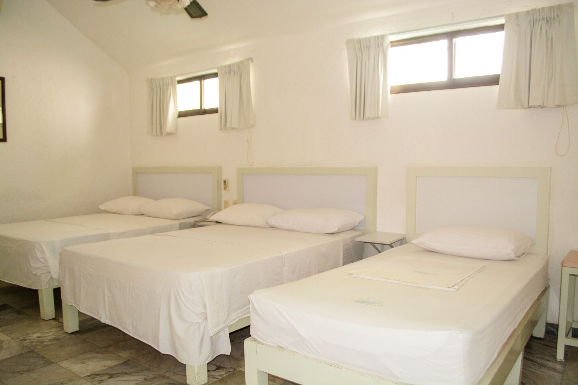 Family, 1 Single and 2 Double Beds
