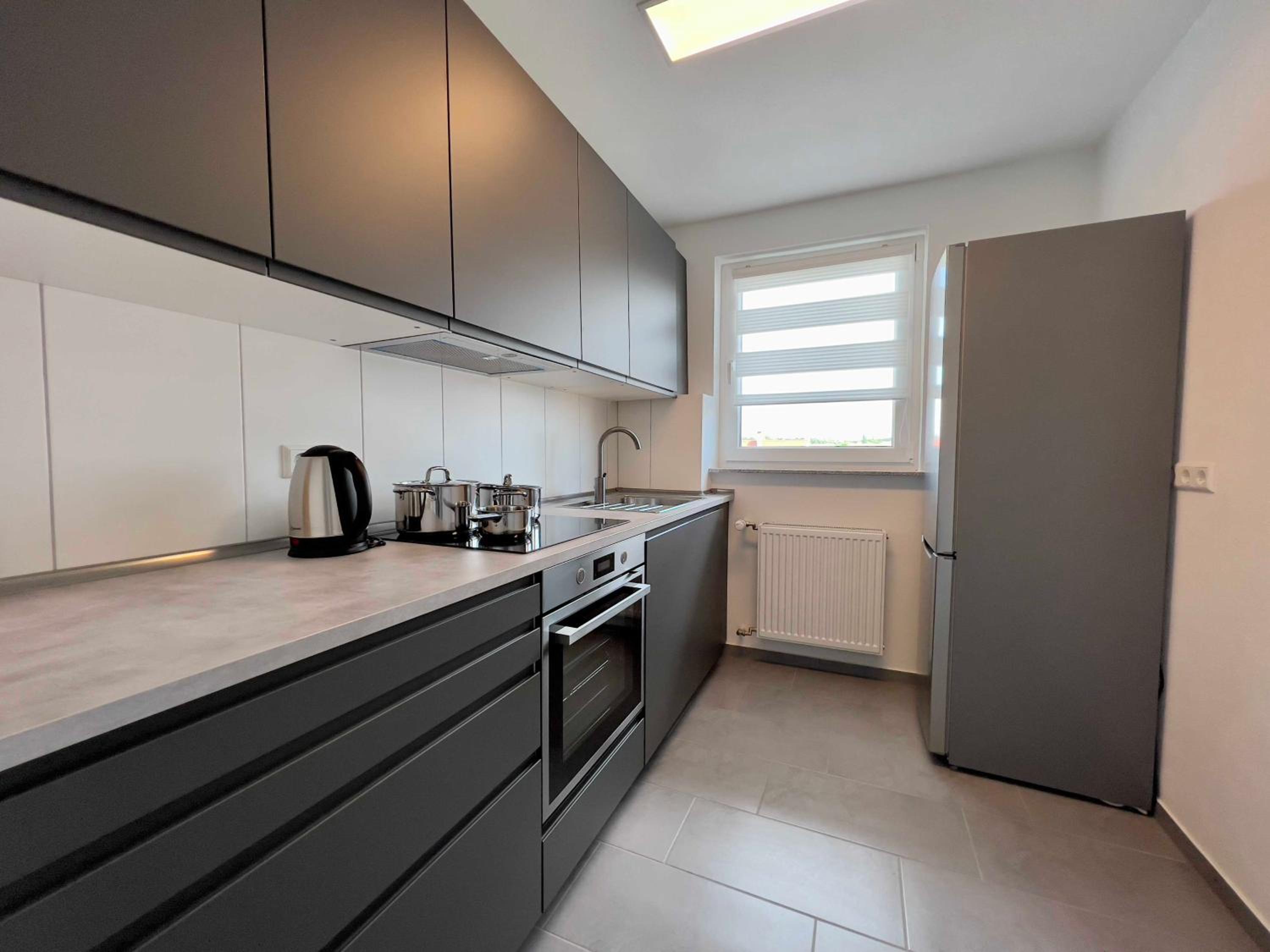 Nujen - Hotel und Apartment Stuttgart Zuffenhausen 5/25