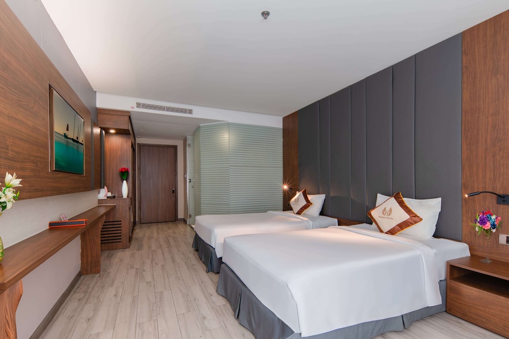 DELUXE, TWIN BEDS, PARTIAL SEA VIEW