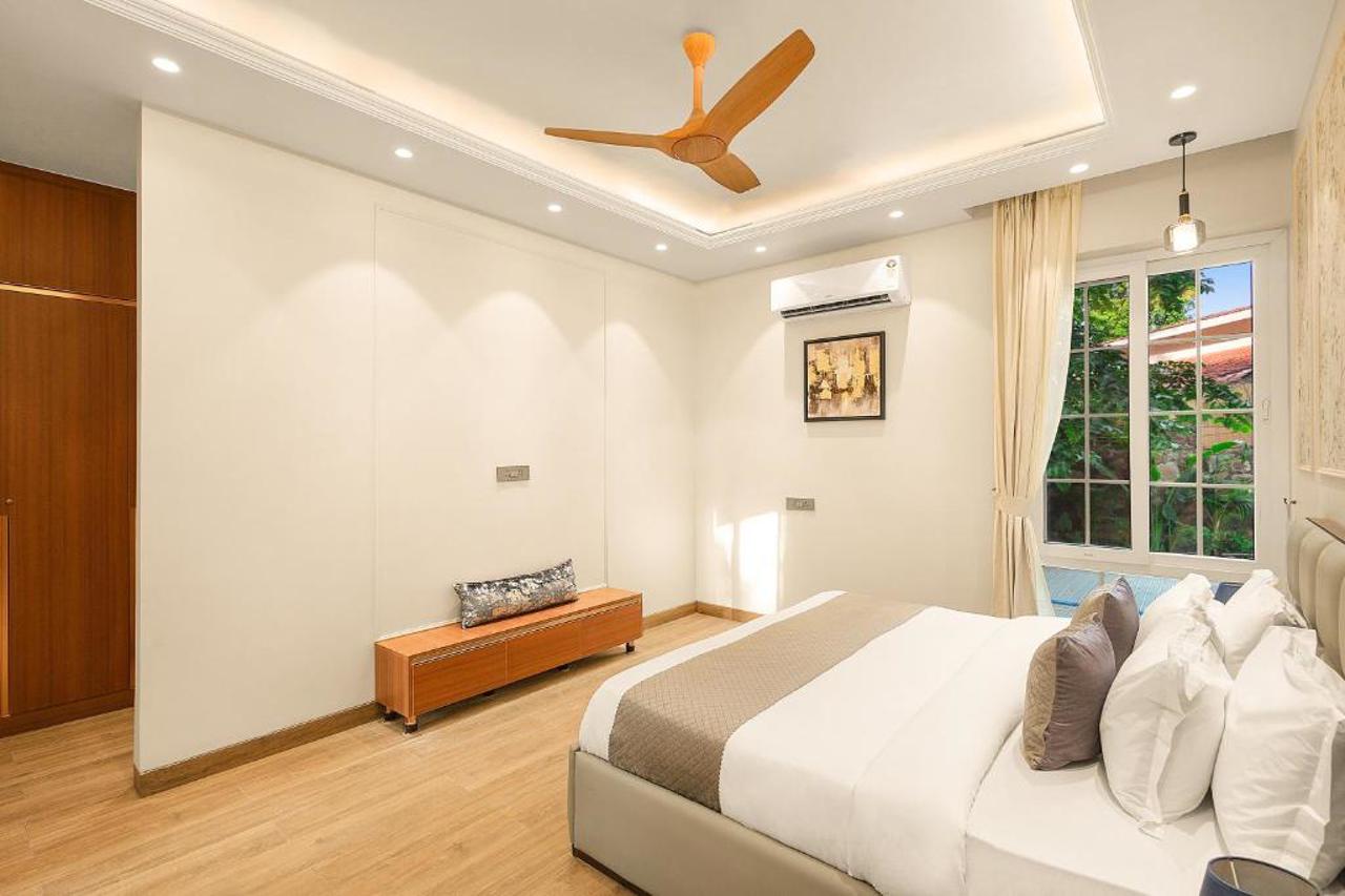 Room at ELIVAAS Varsha Greens A 4-BHK Retreat with Private Pool & Outdoor Patios, Taoru