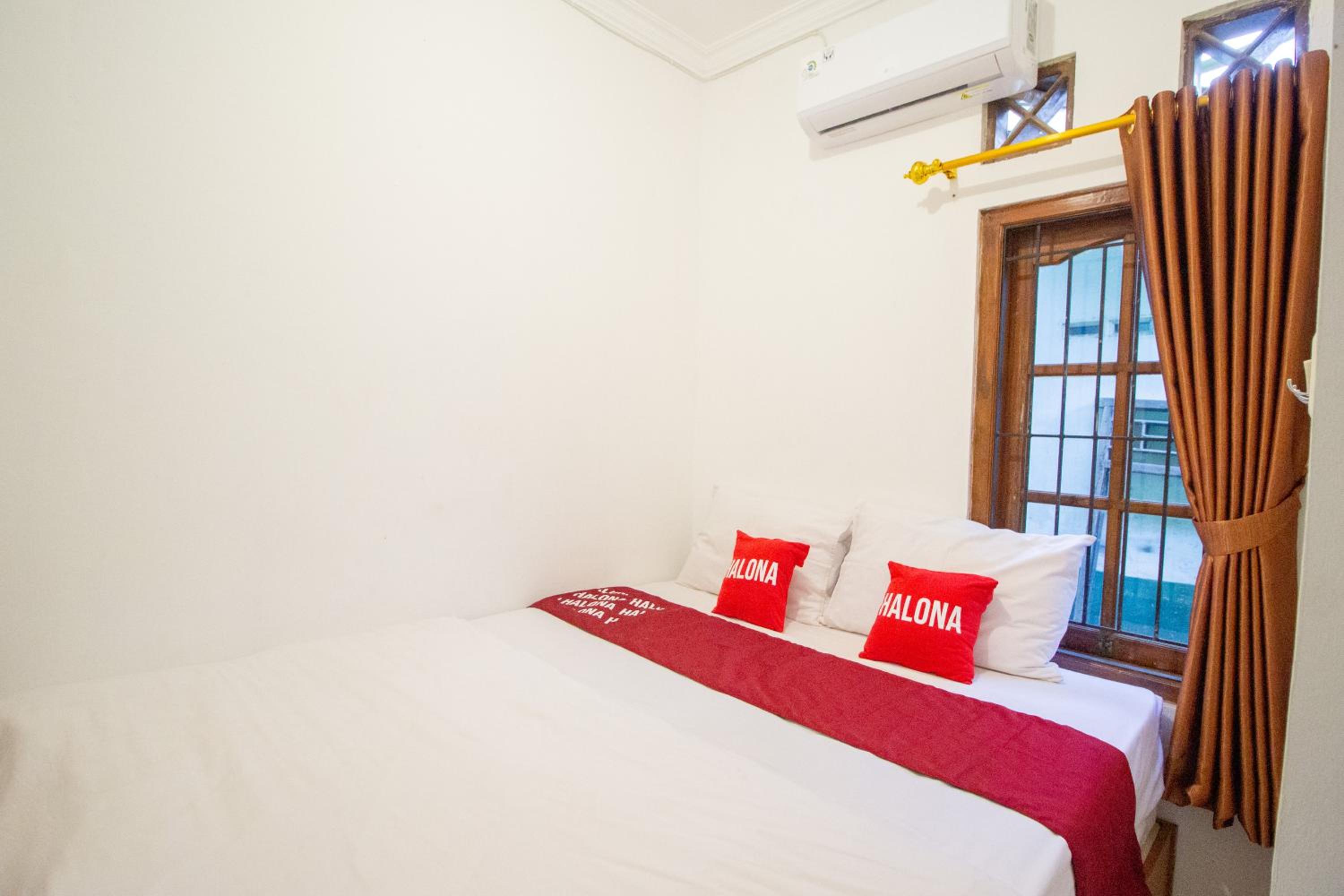 OYO 3707 Halona Guesthouse 25/50