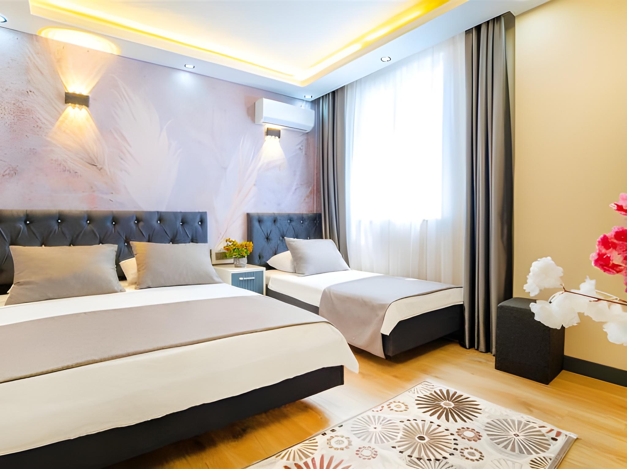 Deluxe, Triple, 1 Double and 1 Single Bed
